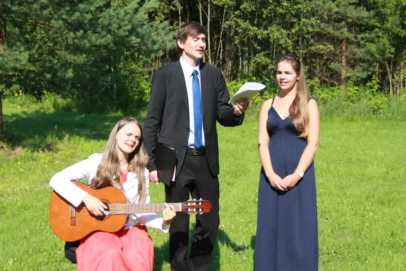 Kristības un bērnu svētīšana Olaines draudzē